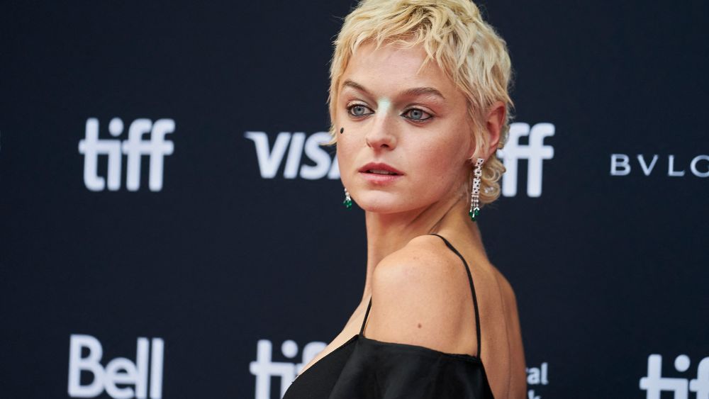 Emma Corrin poses for photographers on the red carpet at the premiere of My Policeman at the Toronto International Film Festival in Toronto, Canada on Sept. 11