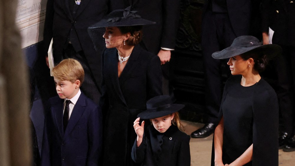 LONDON, ENGLAND - SEPTEMBER 19: Catherine, Princess of Wales, Princess Charlotte of Wales, Prince George of Wales and Meghan, Duchess of Sussex arrive at Westminster Abbey for the State Funeral of Queen Elizabeth II on September 19, 2022 in London, England.  Elizabeth Alexandra Mary Windsor was born in Bruton Street, Mayfair, London on 21 April 1926. She married Prince Philip in 1947 and ascended the throne of the United Kingdom and Commonwealth on 6 February 1952 after the death of her Father, King George VI. Queen Elizabeth II died at Balmoral Castle in Scotland on September 8, 2022, and is succeeded by her eldest son, King Charles III. (Photo by Phil Noble - WPA Pool/Getty Images)