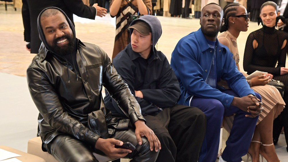 Kanye West, guest, Stormzy, Melissa Holdbrook-Akposoe aka Melissa's Wardrobe and Bruna Marquezine attend the Burberry spring 2023 show.