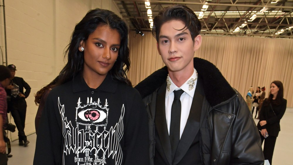 Simone Ashley and Bright attend the Burberry spring 2023 runway show in London.