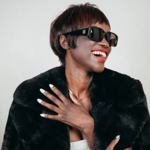 The Rectangle: Tommy Hilfiger’s sunglasses. Saint Laurent coat.
