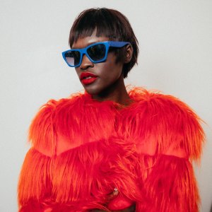 Classic Square: Converse’s upcycled plastic sunglasses. Anna Sui acrylic, polyester and modacrylic coat.