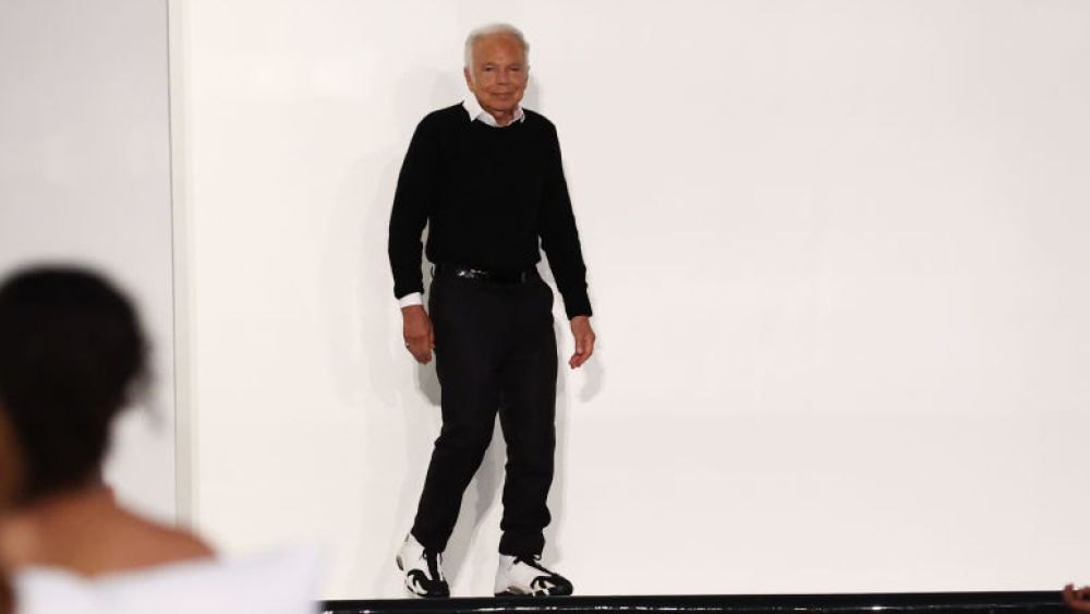 NEW YORK, NEW YORK - MARCH 22: Designer Ralph Lauren waves during the runway finale at the Ralph Lauren Fall 2022 Fashion Show at the Museum of Modern Art on March 22, 2022 in New York City. (Photo by Arturo Holmes/Getty Images)