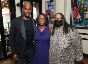 Chris Collins, Cheryl Wills and guest.
