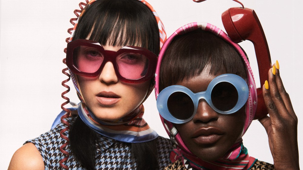 Left: Versace’s acetate glasses. Hermès silk scarf; Emilia Wickstead merinos shetland wool dresses. Right: Loewe’s acetate blue glasses. Hermès silk scarf.