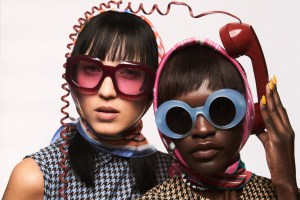 Left: Versace’s acetate glasses. Hermès silk scarf; Emilia Wickstead merinos shetland wool dresses. Right: Loewe’s acetate blue glasses. Hermès silk scarf.