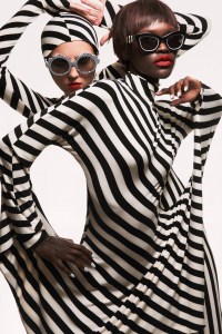 L.A Eyeworks‘ “Biba” acetate glasses (left) and Carolina Herrera’s acetate sunglasses (right). Norma Kamali poly Lycra turtle skull cap cropped top and modern sculpture dress.