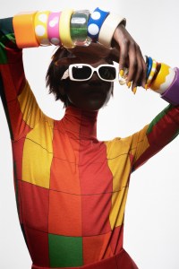 Michael Kors’ acetate glasses. RJ bangles mixed with Retmod retro bangles; Akris cashmere turtleneck.