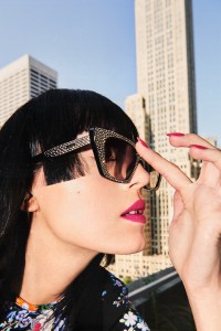 Celine’s acetate and crystal glasses. Paco Rabanne crepe back satin dress.