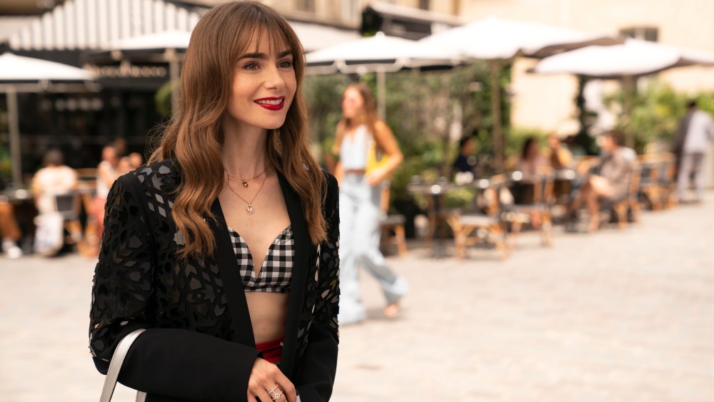 Emily In Paris. Lily Collins as Emily in episode 305 of Emily In Paris. Cr. Stéphanie Branchu/Netflix © 2022