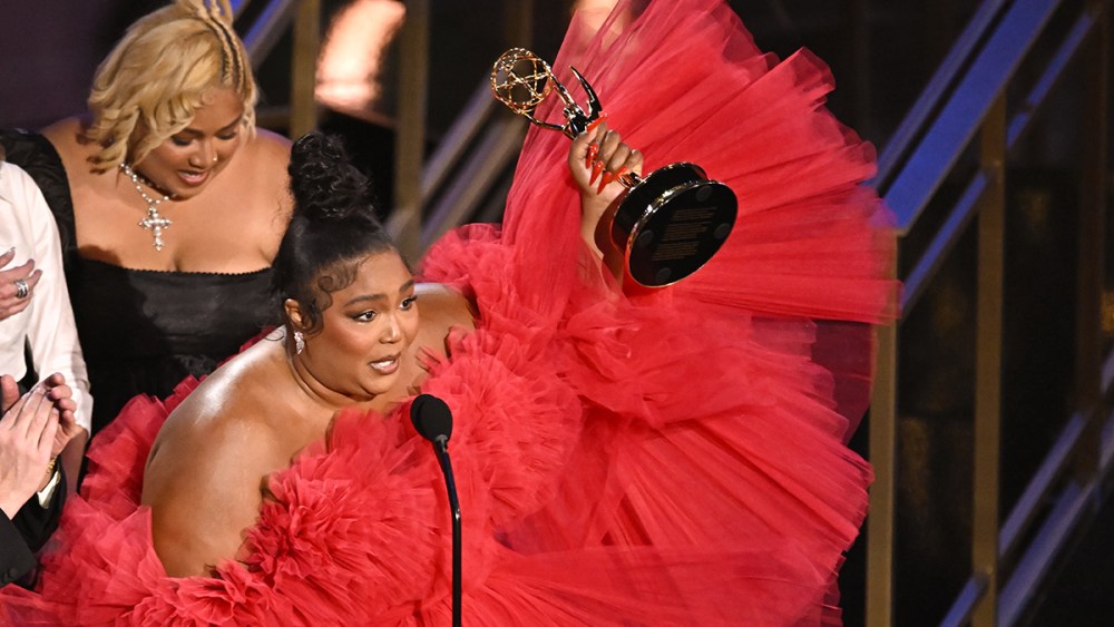 Lizzo red dress accepts the award for Outstanding Competition Program at the 74th Primetime Emmy Awards held at Microsoft Theater on September 12, 2022 in Los Angeles, California.