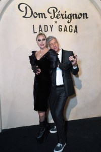 LOS ANGELES, CALIFORNIA - OCTOBER 20: (L-R) Lady Gaga and Maurizio Cattelan are seen as Dom Pérignon and Lady Gaga pursue their creative dialogue at Sheats Goldstein Residence on October 20, 2022 in Los Angeles, California. (Photo by Kevin Mazur/Getty Images for Dom Pérignon)