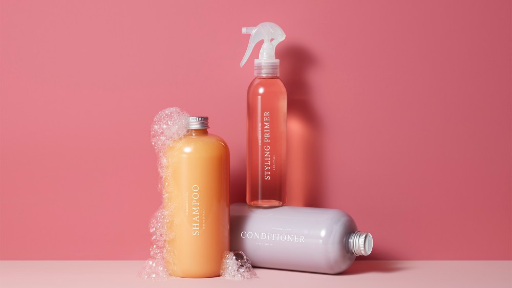 Function of Beauty's new Styling Primer alongside the brand's shampoo and conditioners.