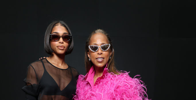PARIS, FRANCE - OCTOBER 02: (EDITORIAL USE ONLY - For Non-Editorial use please seek approval from Fashion House) Lori Harvey  and her mother attend the Valentino Womenswear Spring/Summer 2023 show as part of Paris Fashion Week  on October 02, 2022 in Paris, France. (Photo by Pascal Le Segretain/Getty Images)