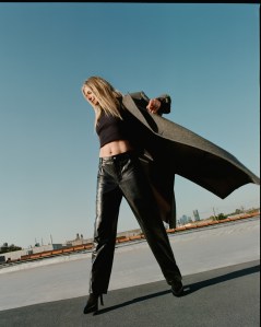 Lafayette 148’s wool coat over Gauchere’s cotton and elastane tank top and Helmut Lang’s leather pants. Givenchy pumps; Christian Dior ring.