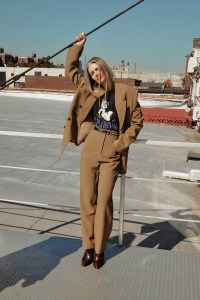 Khaite’s wool drape jacket and pants with stylist’s own vintage T-shirt and belt. Isabel Marant boots.