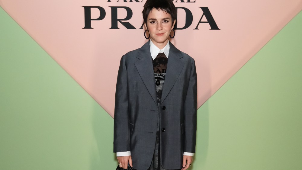 Emma Watson blazer and lace dress attends the Prada Paradoxe fragrance launch party on Oct. 13 in London