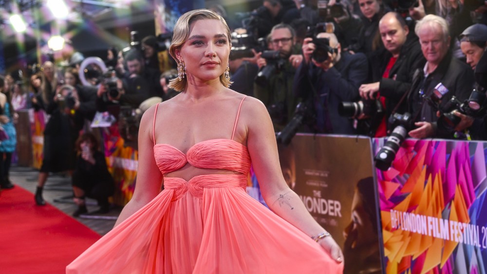 LONDON, ENGLAND - OCTOBER 07: Florence Pugh pink dress attends "The Wonder" UK premiere during the 66th BFI London Film Festival at The Royal Festival Hall on October 07, 2022 in London, England. (Photo by Gareth Cattermole/Getty Images for BFI)