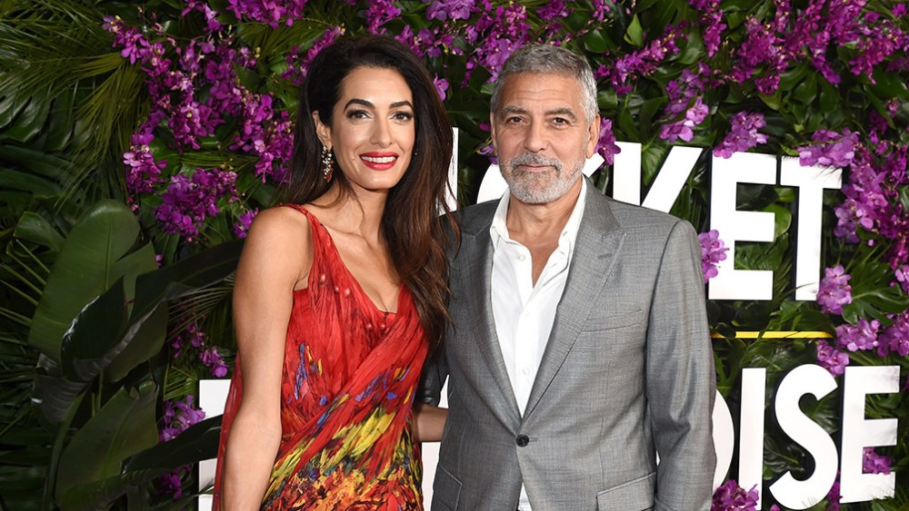 Amal Clooney, George Clooney at "Ticket to Paradise" premiere held at the Regency Village Theatre on October 17, 2022 in Los Angeles, California.