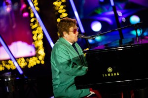 Sir Elton John performs in the opening ceremony for Saks Fifth Avenue’s Holiday Windows and Light show on November 22, 2022 in New York City.