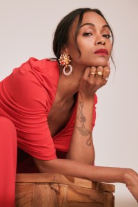 Et Ochs’ stretch cady and crepe jersey jumpsuit. Schiaparelli earring. Vendorafa 18-karat yellow gold dome ring; Bulgari Serpenti Viper ring in 18k yellow gold with diamonds; David Yurman ring in 18k yellow gold with pavé diamonds; Anita Ko gold ring; Delfina Delettrez 18k gold, 0.05-carat white diamond and akoya pearl ring; Hamilton Jewelers 18k rose gold ring.