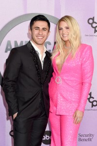 Chris Olsen and Meghan Trainor at the 2022 American Music Awards held at the Microsoft Theater at L.A. Live on November 20, 2022 in Los Angeles, California.