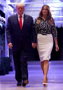 Former U.S. President Donald Trump and former first lady Melania Trump arrive for an event at his Mar-a-Lago home on Nov. 15, 2022 in Palm Beach, Florida.