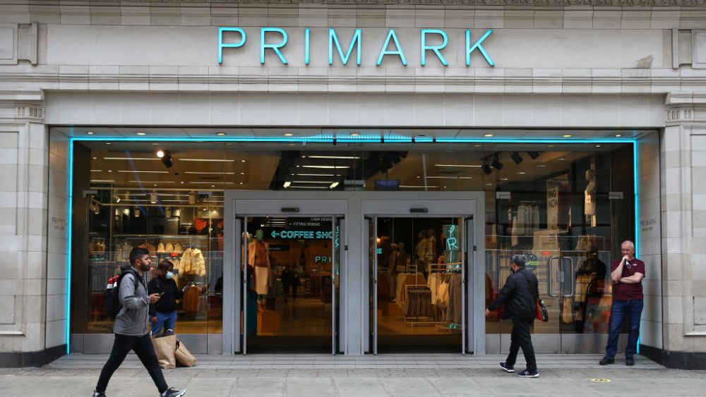 LONDON, ENGLAND - AUGUST 28: A pedestrian walks past a Primark store on Oxford Street on August 28, 2021 in London, England. Primark is offering Covid vaccinations at some of its stores over the Bank Holiday weekend. (Photo by Hollie Adams/Getty Images)