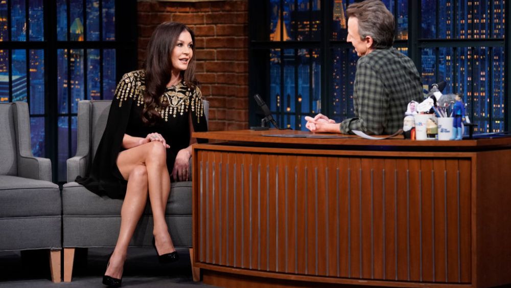 LATE NIGHT WITH SETH MEYERS --  Episode 1365 -- Pictured: (l-r) Actress Catherine Zeta-Jones during an interview with host Seth Meyers on December 8, 2022 -- (Photo by: Lloyd Bishop/NBC via Getty Images)