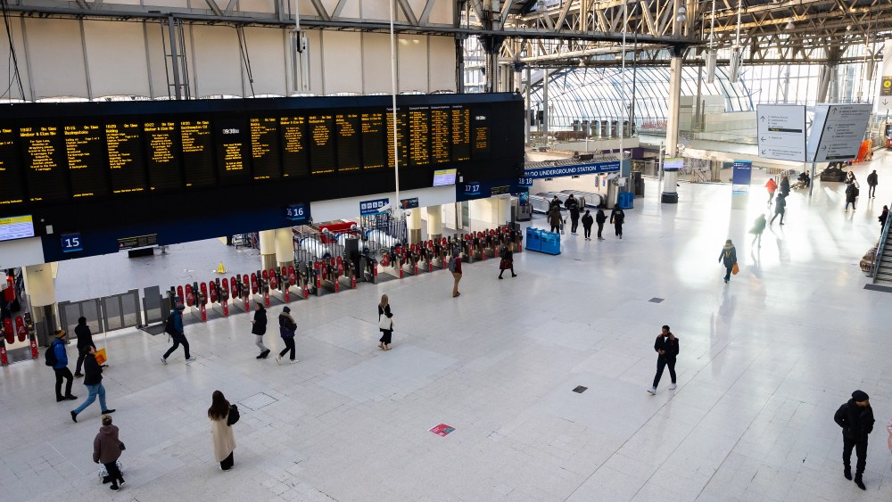 LONDON, UNITED KINGDOM - 2022/12/14: People are seen at Waterloo Station in London. Rail services are heavily affected by the Rail, Maritime, and Transport Union (RMT)'s industrial strike action running from 14th-19th December and again from the 24th-27th December. (Photo by Tejas Sandhu/SOPA Images/LightRocket via Getty Images)
