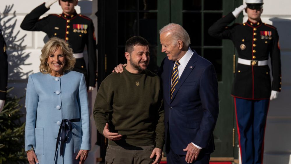 President Joe Biden first lady Jill Biden in blue dress welcome the President of Ukraine on Dec. 21 in Washington, DC.