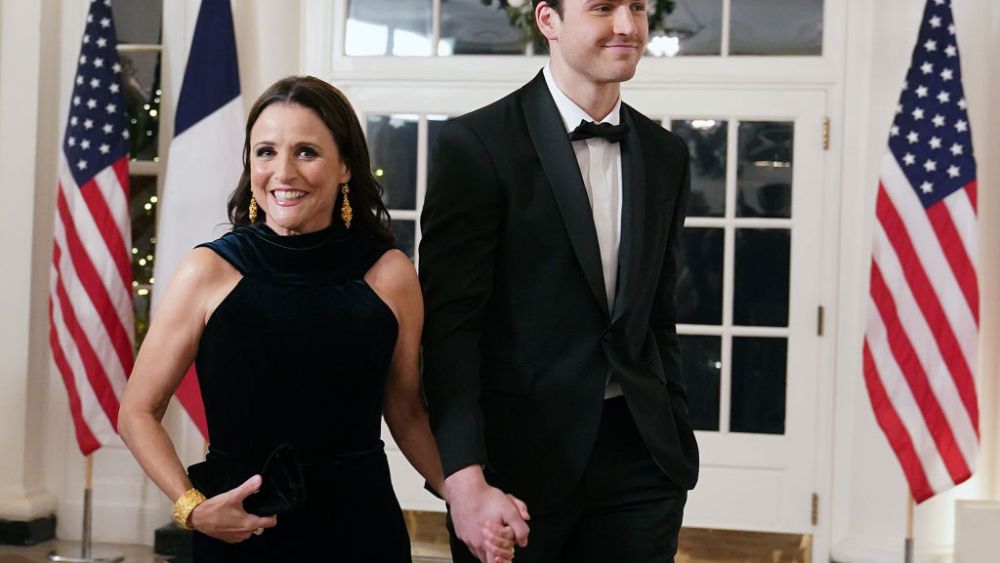 WASHINGTON, DC - DECEMBER 01: Actress Julia Louis-Dreyfus and her son Charlie Hall arrive for the White House state dinner for French President Emmanuel Macron at the White House on December 1, 2022 in Washington, DC. The official state visit is the first of the Biden administration.  (Photo by Nathan Howard/Getty Images)