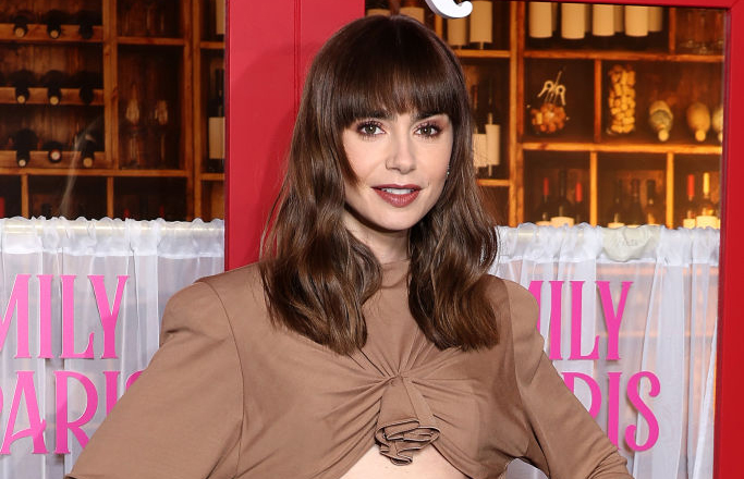 PARIS, FRANCE - DECEMBER 06: Lily Collins attends the "Emily In Paris" by Netflix - Season 3 World Premiere at Theatre Des Champs Elysees on December 06, 2022 in Paris, France. (Photo by Pascal Le Segretain/Getty Images)