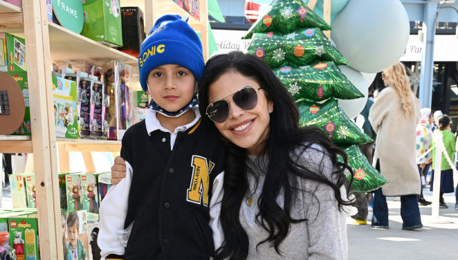 LOS ANGELES, CALIFORNIA - DECEMBER 14: Lauren Sanchez (R) and guest attend The Baby2Baby Holiday Distribution presented by FRAME and Nordstrom at Dodger Stadium on December 14, 2022 in Los Angeles, California. (Photo by Michael Kovac/Getty Images for Baby2Baby)
