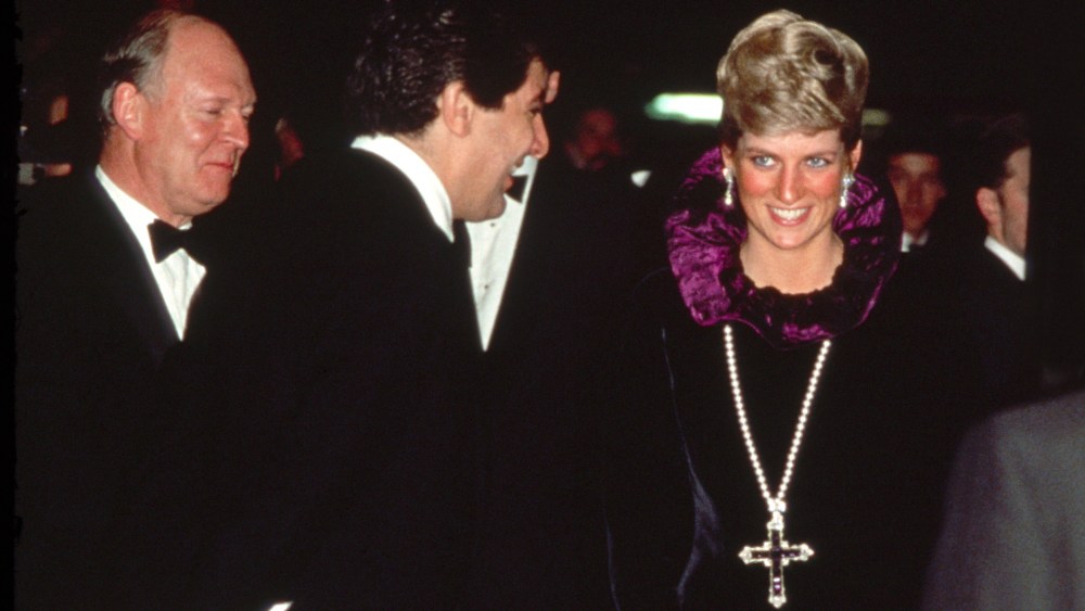 LONDON, UNITED KINGDOM - OCTOBER 27:  Diana, Princess Of Wales, Arriving At A Charity Gala Evening On Behalf Of Birthright At Garrard.  The Princess Is Wearing A Purple Evening Dress With A Gold And Amethyst Crucifix Suspended On A Pearl Rope.  (Photo by Tim Graham Photo Library via Getty Images)