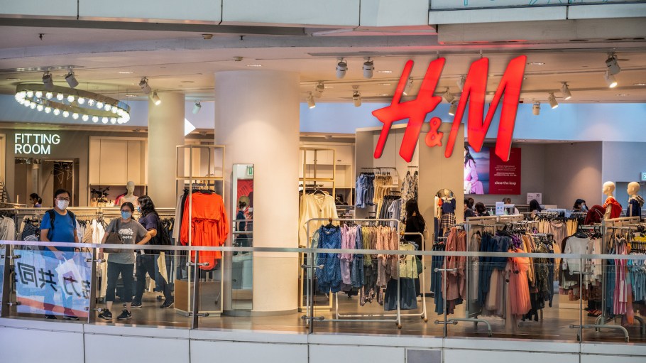 Shoppers are seen at the Swedish multinational clothing design retail company Hennes & Mauritz, H&M store in Hong Kong.