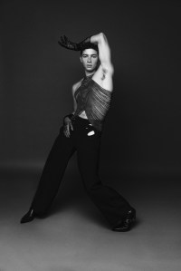 Dion Lee’s metal chain fringe top, cotton pants and lace gloves. Celine boots; Natasha Schweitzer diamond hoop earring.