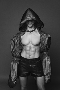 Puma’s nylon caplet made in collaboration with June Ambrose and Fendi’s leather shorts. Thom Browne shoes; Pamela Love twisted sterling silver hoop earrings; Alexander McQueen necklace.