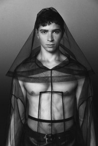 Rick Owens’ nylon tulle pullover caftan and Moschino’s leather skirt. Jil Sander boots