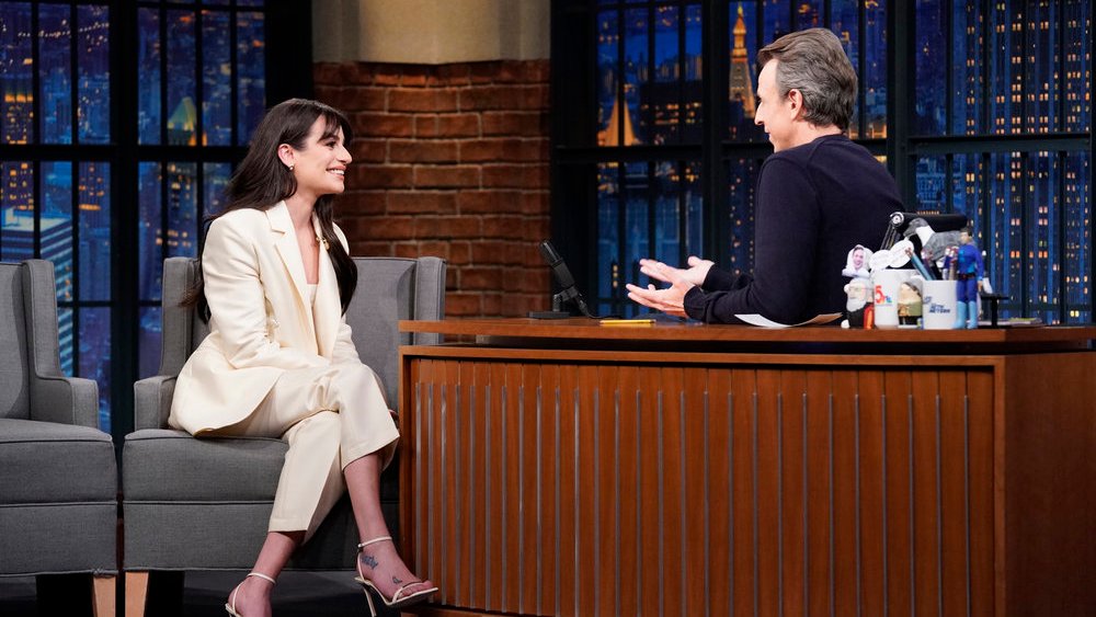 LATE NIGHT WITH SETH MEYERS -- Episode 1362 -- Pictured: (l-r) Actress/singer Lea Michele during an interview with host Seth Meyers on December 5, 2022 -- (Photo by: Lloyd Bishop/NBC)