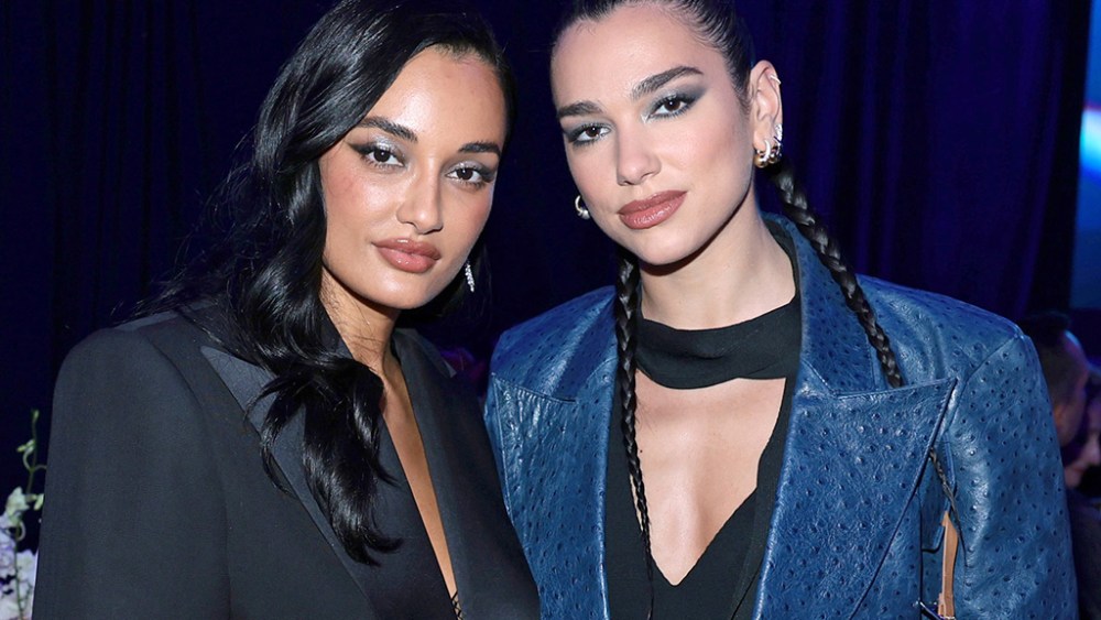 NEW YORK, NEW YORK - NOVEMBER 30: (L-R) Amina Muaddi and Dua Lipa attend the 2022 Footwear News Achievement Awards at Cipriani South Street on November 30, 2022 in New York City. (Photo by Dimitrios Kambouris/Footwear News via Getty Images)