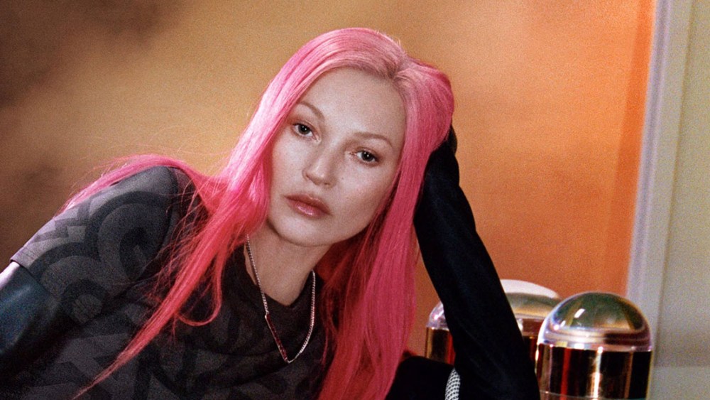 Kate Moss is pretty in pink hair in a new ad campaign for Marc Jacobs Resort. The 48-year-old British model showcases bright pink hair - rather than her usual blonde locks - in ads for the fashion brand. The ads are for the company's famous 'Bucket Bag' - described as a "classic silhouette featuring supple full grain leather, rope top handle, with a removable and adjustable leather strap". She also wears their sky-high Kiki boots from Marc Jacobs Runway. Kate first collaborated with Marc Jacobs back in 2000. The images were styled by Danielle Emerson and photographed by Harley Weir in London. Editorial usage. Credit Courtesy of Marc Jacobs / MEGA. 20 Dec 2022 Pictured: Kate Moss for Marc Jacobs. Photo credit: Courtesy of Marc Jacobs/MEGA TheMegaAgency.com +1 888 505 6342 (Mega Agency TagID: MEGA927678_001.jpg) [Photo via Mega Agency]