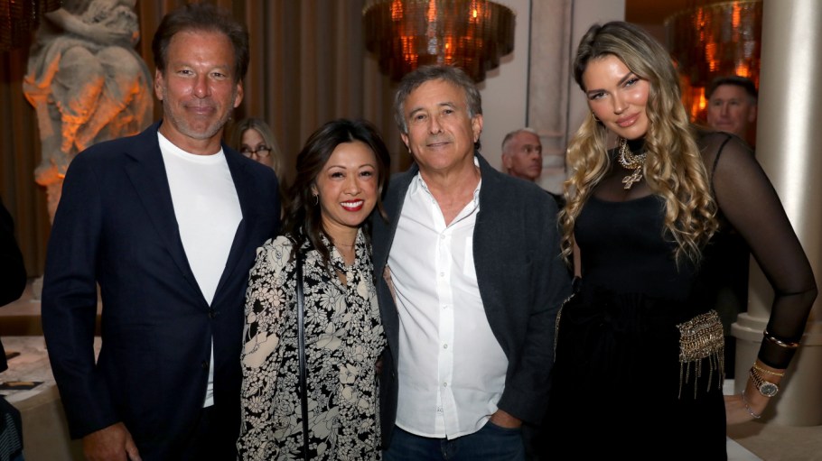 SAN FRANCISCO, CALIFORNIA - MARCH 17:(L-R) guest, Gary Friedman, Chief Executive Officer of Restoration Hardware, guest, guest and Bella Hunter are seen as RH Celebrates The Unveiling of RH San Francisco, The Gallery at the Historic Bethlehem Steel Building on March 17, 2022 in San Francisco, California.