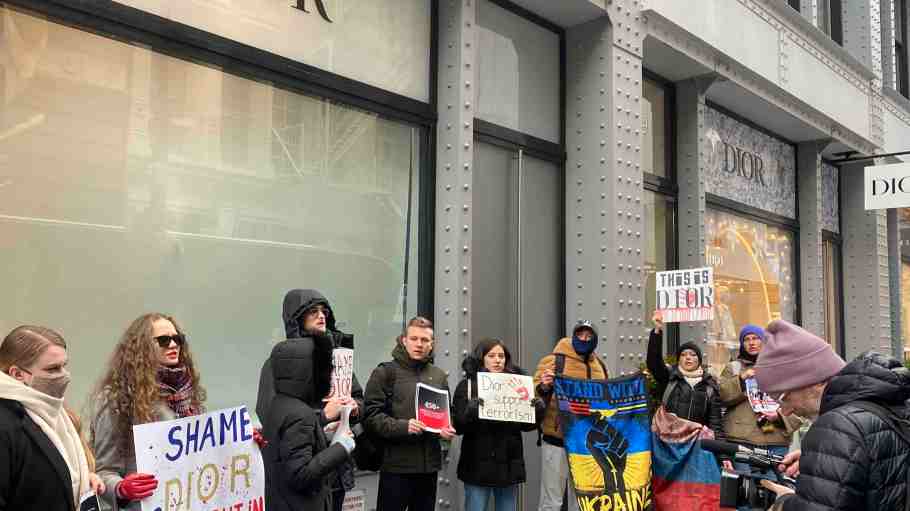Protestors gather outside the Dior store in the SoHo district of New York on Thursday. Their third protest at a Dior location since it was revealed the brand invited a pro-Putin TV presenter to its Haute Couture party at Paris Fashion Week.