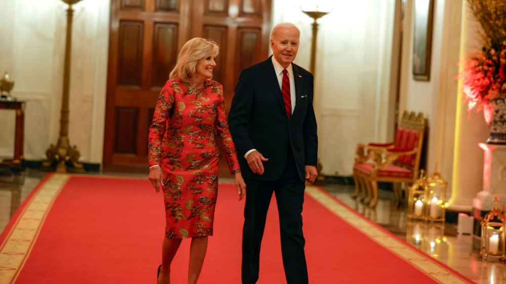 WASHINGTON, DC - JANUARY 26:  U.S. first Lady Jill Biden and President Joe Biden arrive for  a reception celebrating Lunar New Year in the East Room of the White House on January 26, 2023 in Washington, DC. During the reception, the president and Mrs. Biden acknowledged the recent shootings in the Asian American and Pacific Islander communities in California and stressed their hopes to pass legislation reforming gun control. (Photo by Anna Moneymaker/Getty Images)