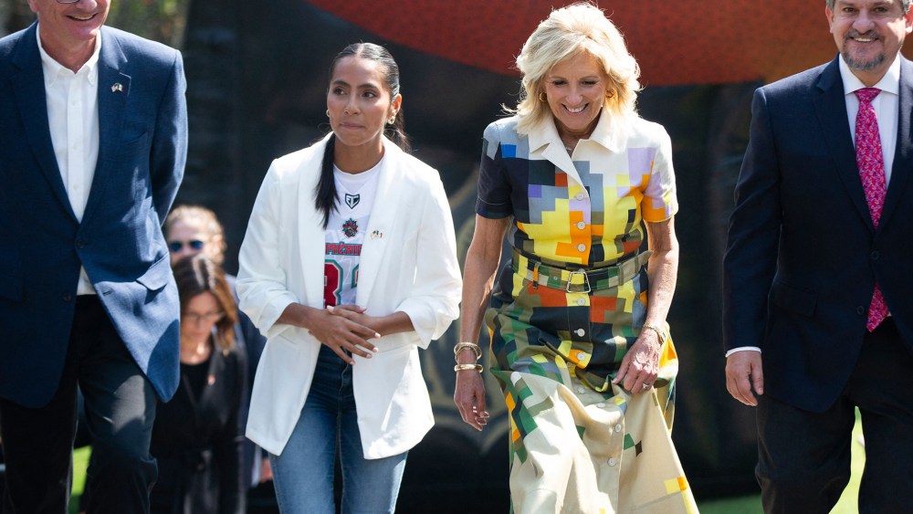 Arturo Olive, Managing Director of NFL Mexico, Diana Flores, Quarterback of the Mexico Women National Flag Football Team, US First Lady Jill Biden, and Luis Fernandez, Head of the Federal Education Authority in Mexico, attend a Tochito NFL Flag Football event in Mexico City on January 9, 2023
