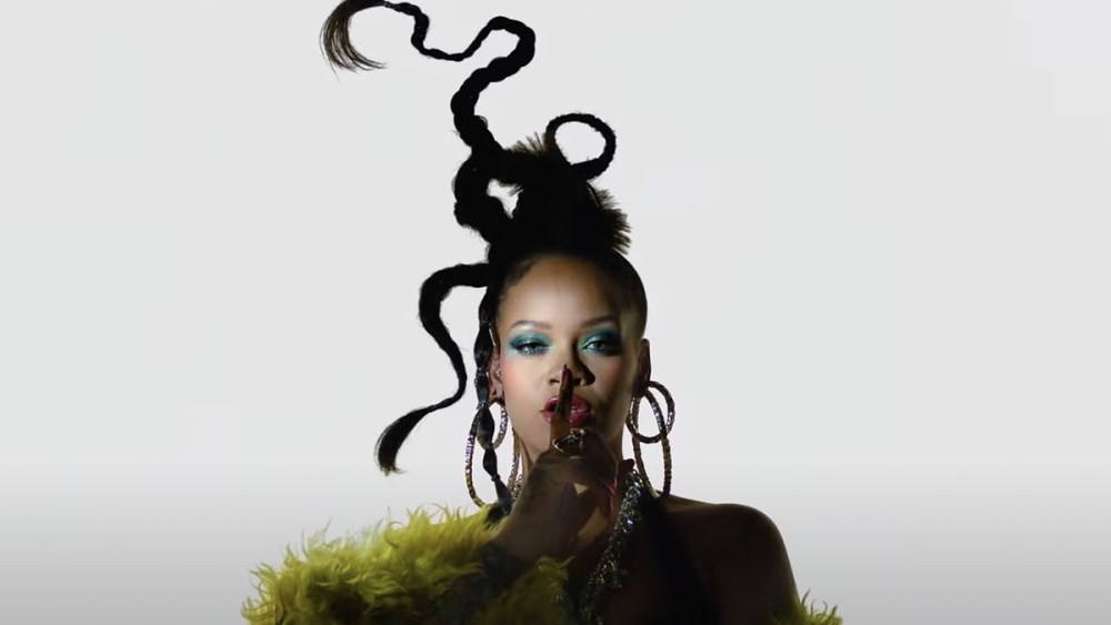 rihanna super bowl halftime show, youtube teaser video, area green coat fall 2022, braids, new haircut