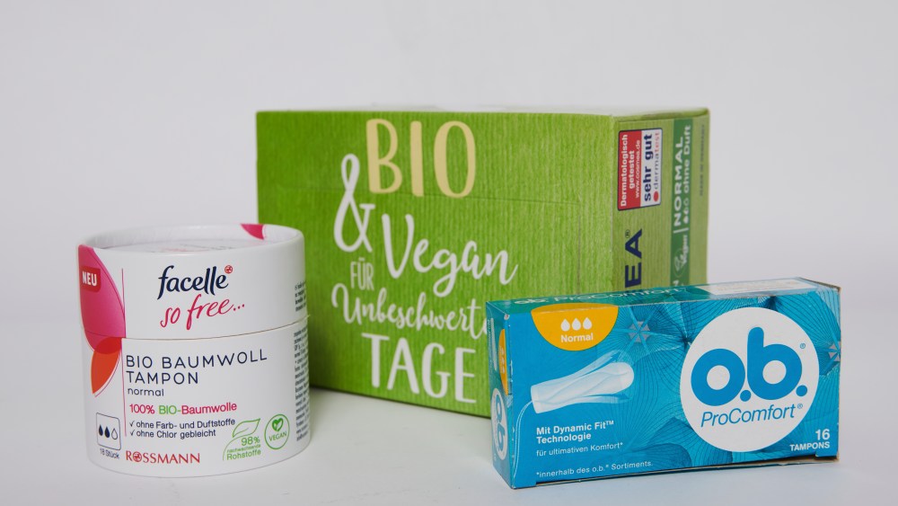 ILLUSTRATION - 03 December 2020, Berlin: Women's hygiene articles from various manufacturers, including tampons from Rossmann's own brand "facelle" made of organic cotton, panty liners from Cosmea made of organic cotton and tampons from the o.b. brand are on one table. Photo by: Annette Riedl/picture-alliance/dpa/AP Images