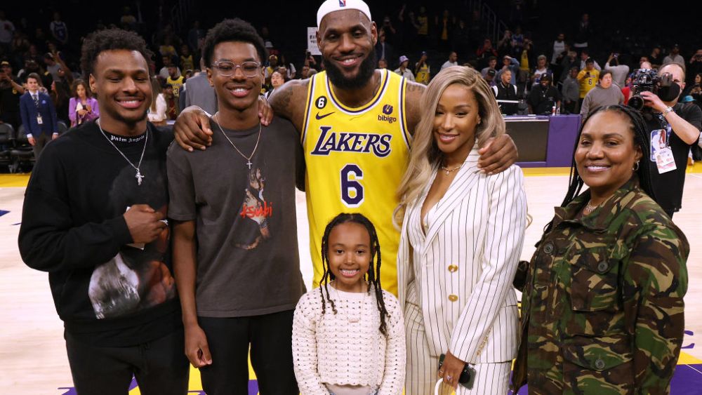 LeBron and Savannah James posing for a picture with their family at the end of the Oklahoma City Thunder vs Los Angeles Lakers basketball game on Feb. 7 in Los Angeles.