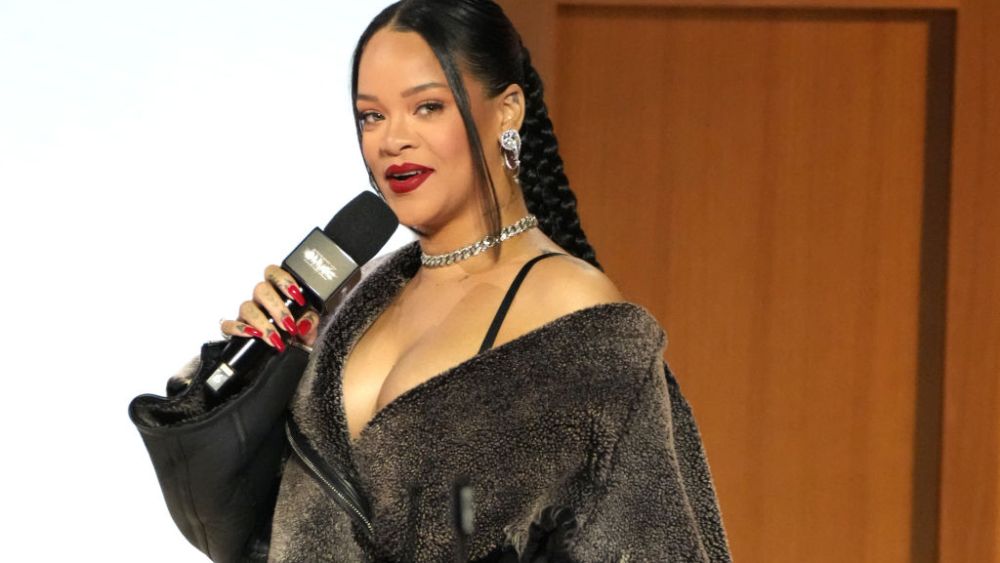 PHOENIX, ARIZONA - FEBRUARY 09: Rihanna speaks during a press conference for Apple Music Super Bowl LVII Halftime Show at Phoenix Convention Center on February 09, 2023 in Phoenix, Arizona. (Photo by Jeff Kravitz/FilmMagic)